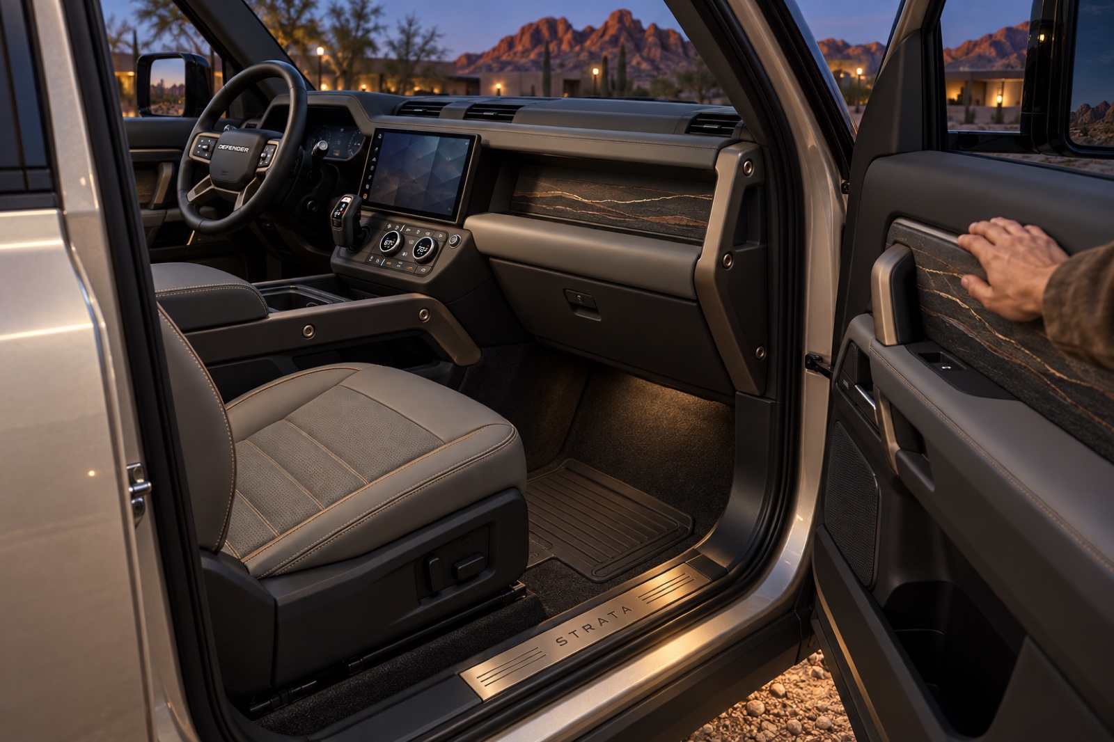 Layered cabin trim and an illuminated Strata sill carry the exterior theme inside.